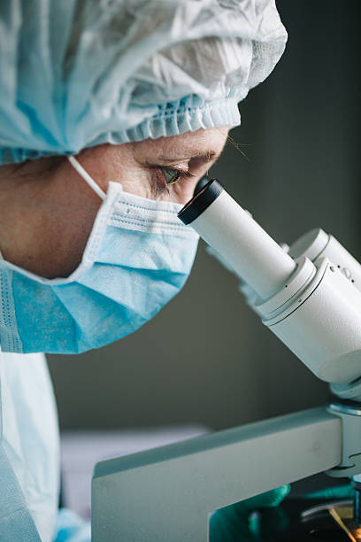 istock Close up view of scientist eye 637310814