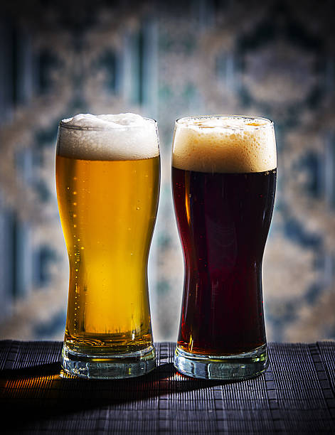 istock Glasses of light and dark beer 637310844