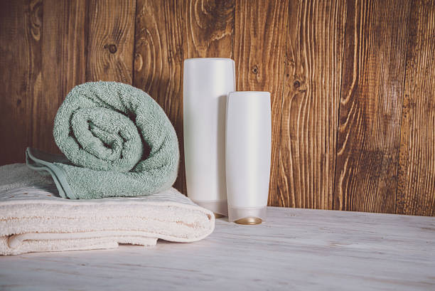 istock Stacked towels on wooden background 637311018