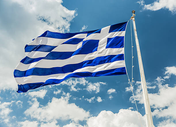 istock National flag of Greece on flagpole 637311926