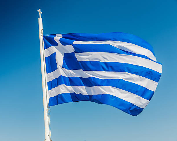 istock National flag of Greece on flagpole 637311976
