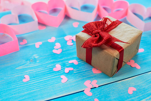 istock Top view of present and pretty hearts 637318196