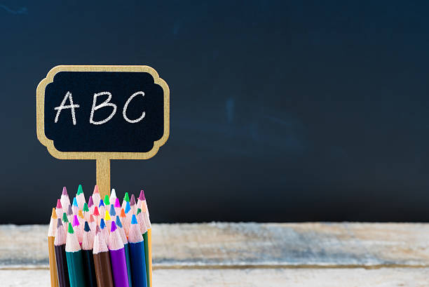 istock Wooden mini blackboard label with message ABC 637318304