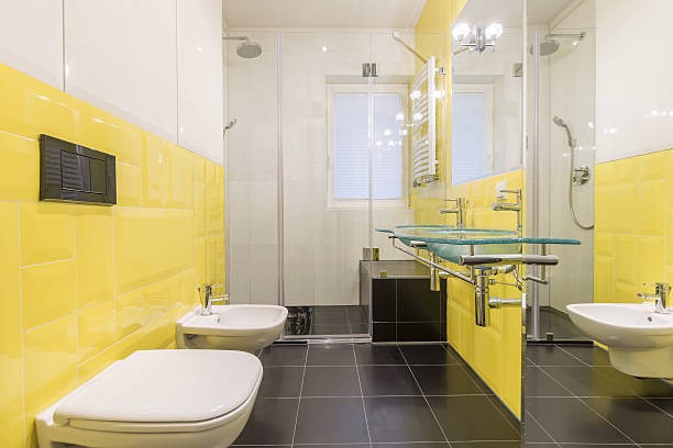 istock Bathroom with yellow tiles 637318966