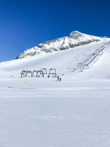istock snowy mountain peaks on hintertux at zillertal 637319510