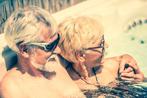 istock Senior Couple Enjoying Summer Day in Whirlpool 637324274