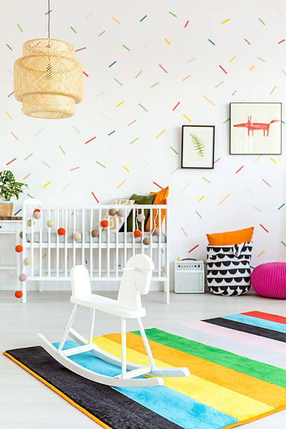 istock Baby room with rocking horse 637324424