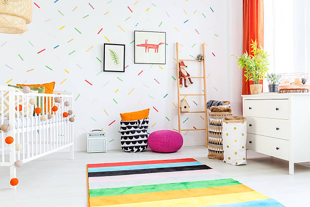 istock Baby room with white dresser 637324496