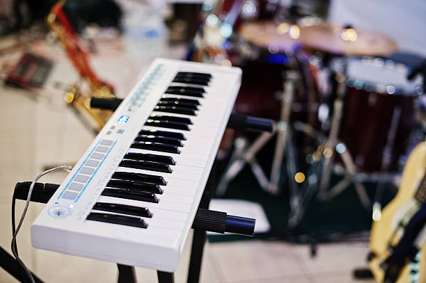 istock Electric piano synthesizer keyboard on stage 637324602