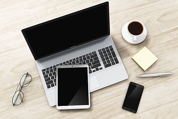 istock Laptop, tablet and smartphone on office table 637324898