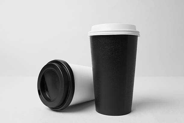 istock Black and white paper cup mockup 637327868