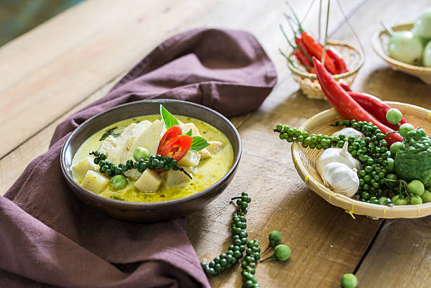 istock spicy hot chicken green curry with coconut milk soup 637328638