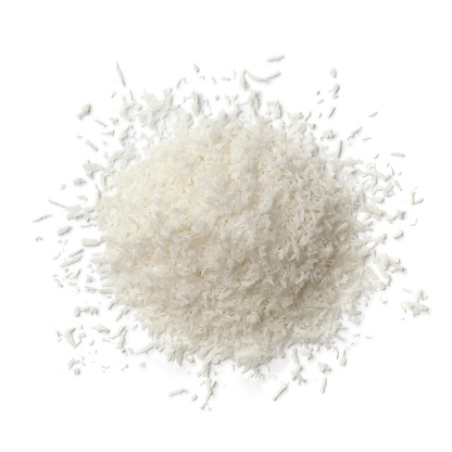 Heap of shredded coconut meat on white background