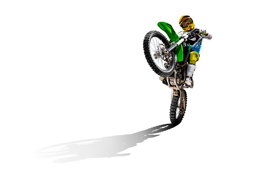 Dirt bike and rider isolated on white background