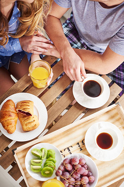 istock Directly above shot of couple during breakfast 637332032