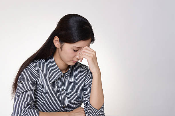 istock Disappointed Asian woman 637332148
