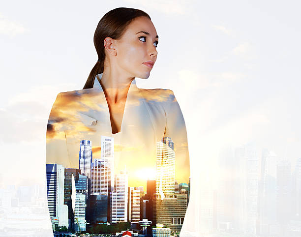 istock Thoughtful woman on city background 637333010
