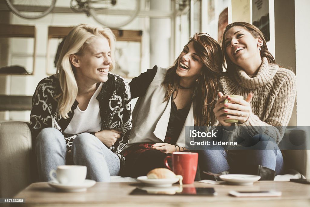 Funny girls. Girls having fun at home, laughing. Friendship Stock Photo