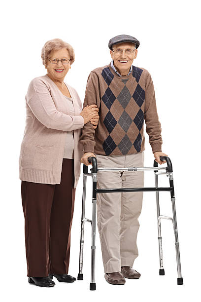 istock Mature woman and a mature man with a walker 637334932