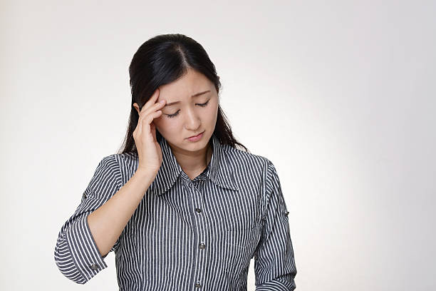 istock Woman who has a headache 637341100