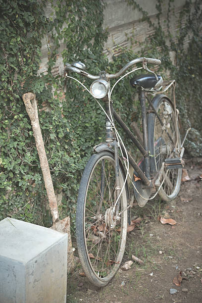 istock Old Bicycle parking on street with retro style. 637343814