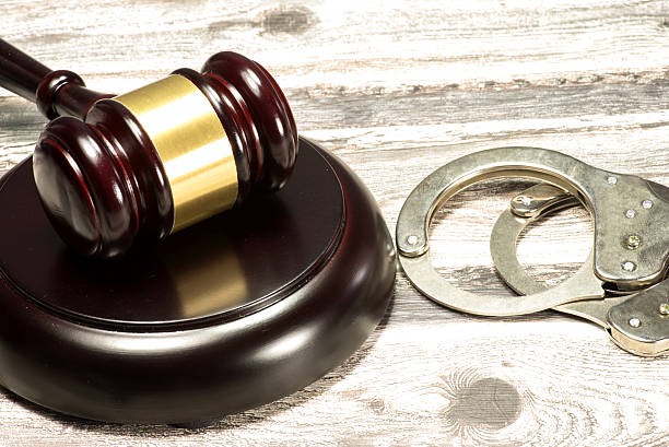 istock Judge's hammer and handcuffs 637346940