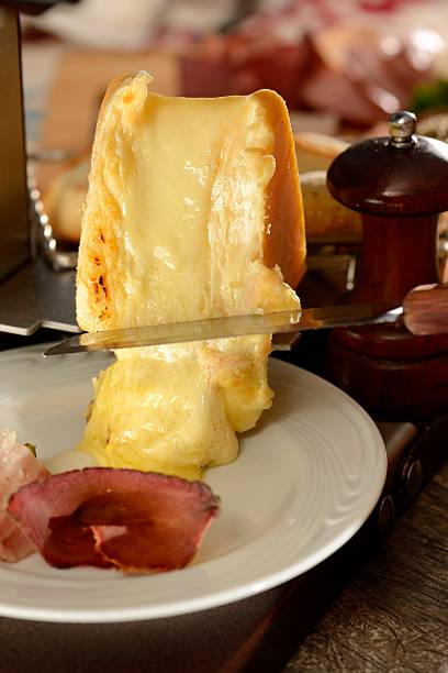 раклет - raclette cheese стоковые фото и изображения