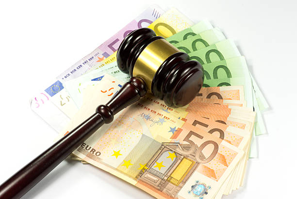 istock Richterhammer or Auction hammer and banknotes 637348470