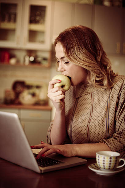 istock Woman surfing the net at home. 637349192