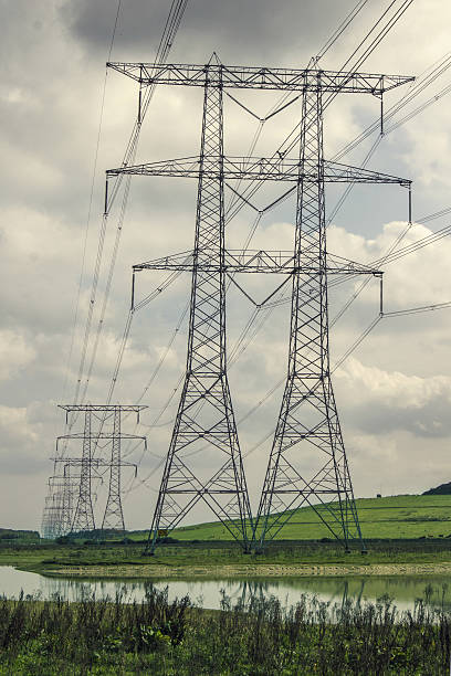 istock Electricity pylons in a row 637350514