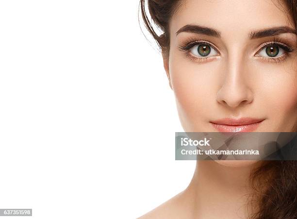 Beautiful Face Of Young Woman With Perfect Skin Isolated White Stock Photo - Download Image Now