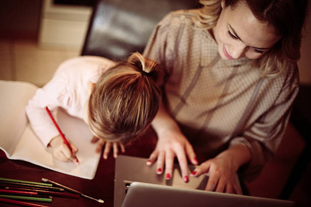 busy mom. - house pen people caucasian imagens e fotografias de stock