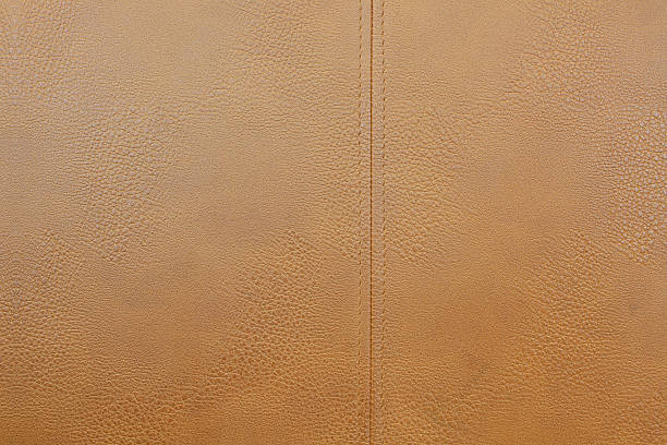istock Empty brown animal skins Tailor crafting business sewing line 637353954