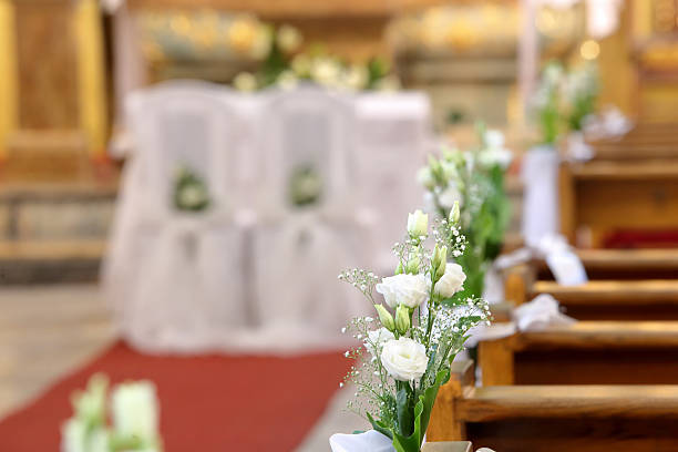 istock Decoration flowers in the church before wedding ceremony 637355708