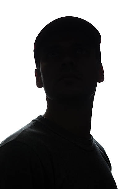 istock Portrait of a young man in cap, front view 637357182