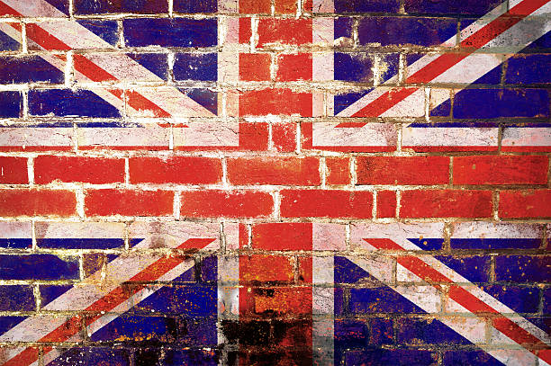 istock Flag of England painted on a grunge wall... 637358760