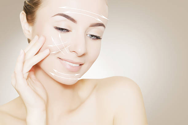 istock woman face portrait with lifting marks 637359250