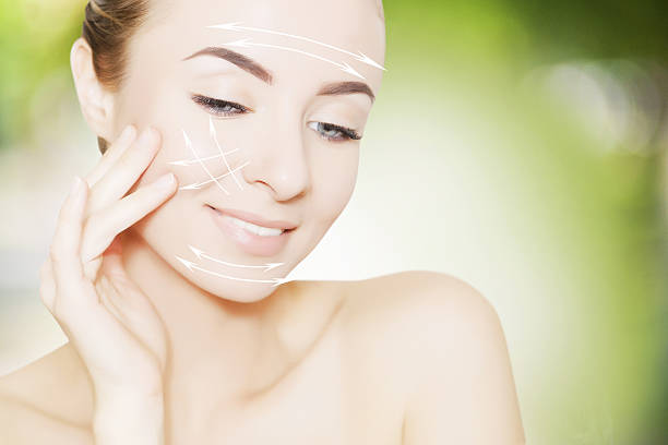 istock woman face portrait with lifting marks 637359460