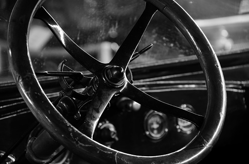 Vintage car with a nice wooden steering wheel.