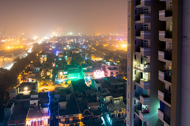 paisaje urbano de noida con luces de colores en diwali - new delhi india night government fotografías e imágenes de stock