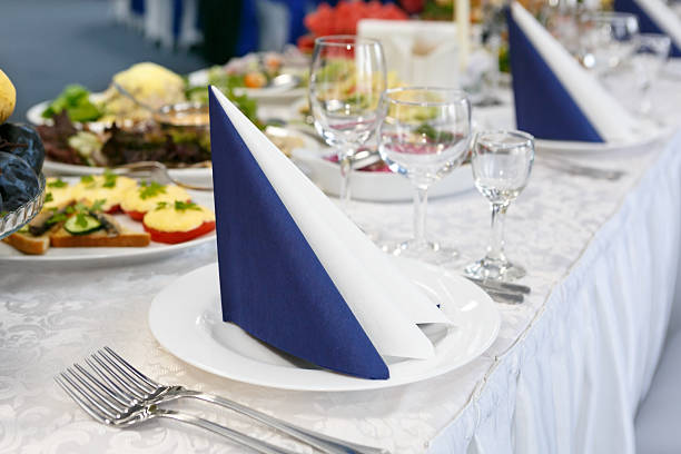 istock fragment of serving a festive table with blue-white napkin. Soft 637361692
