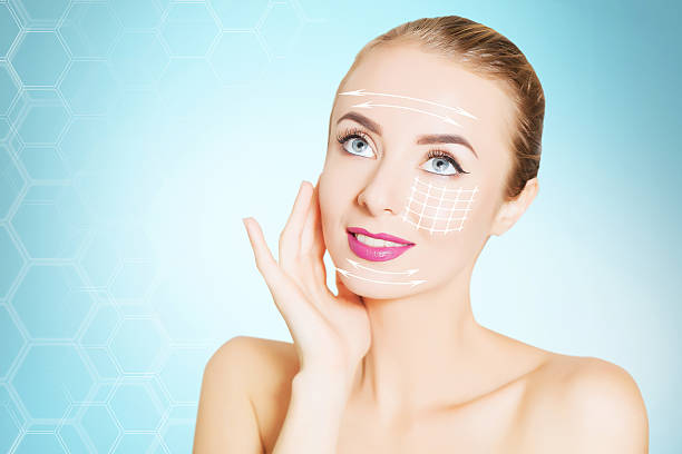 istock woman face portrait with lifting marks 637363346