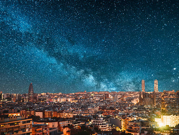 Barcelona at night A night view of Barcelona, Spain, under a starry sky barcelona skyline stock pictures, royalty-free photos & images