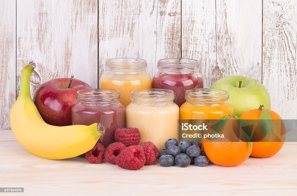 Fruit smoothies for a baby Jars with fruit smoothies for a baby  Baby Food Stock Photo