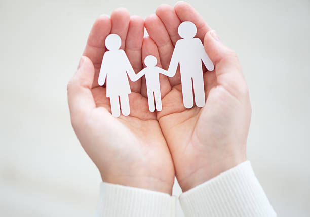 istock Paper family in hands 637365136
