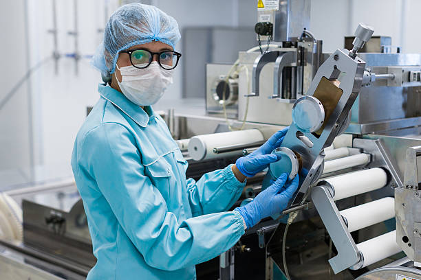 istock food technician works in a factory 637366124