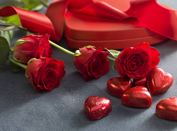 istock Gift box with red roses and chocolates. Valentines Day concept 637366210