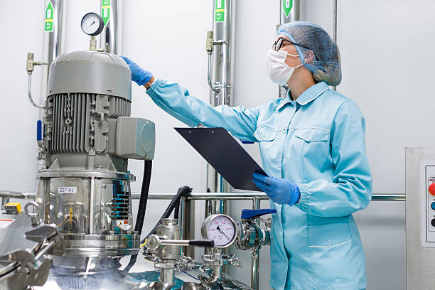 istock scientist monitors the readings on the equipment 637368426