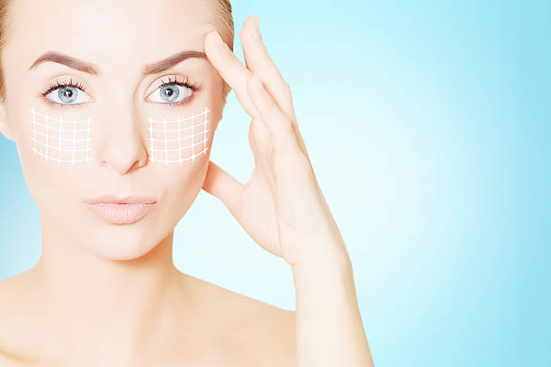 istock woman face portrait with lifting marks 637370124