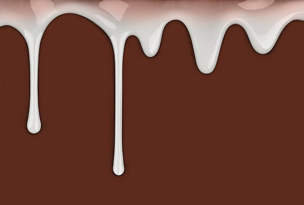 istock drips of condensed milk on a chocolate brown background 637370522